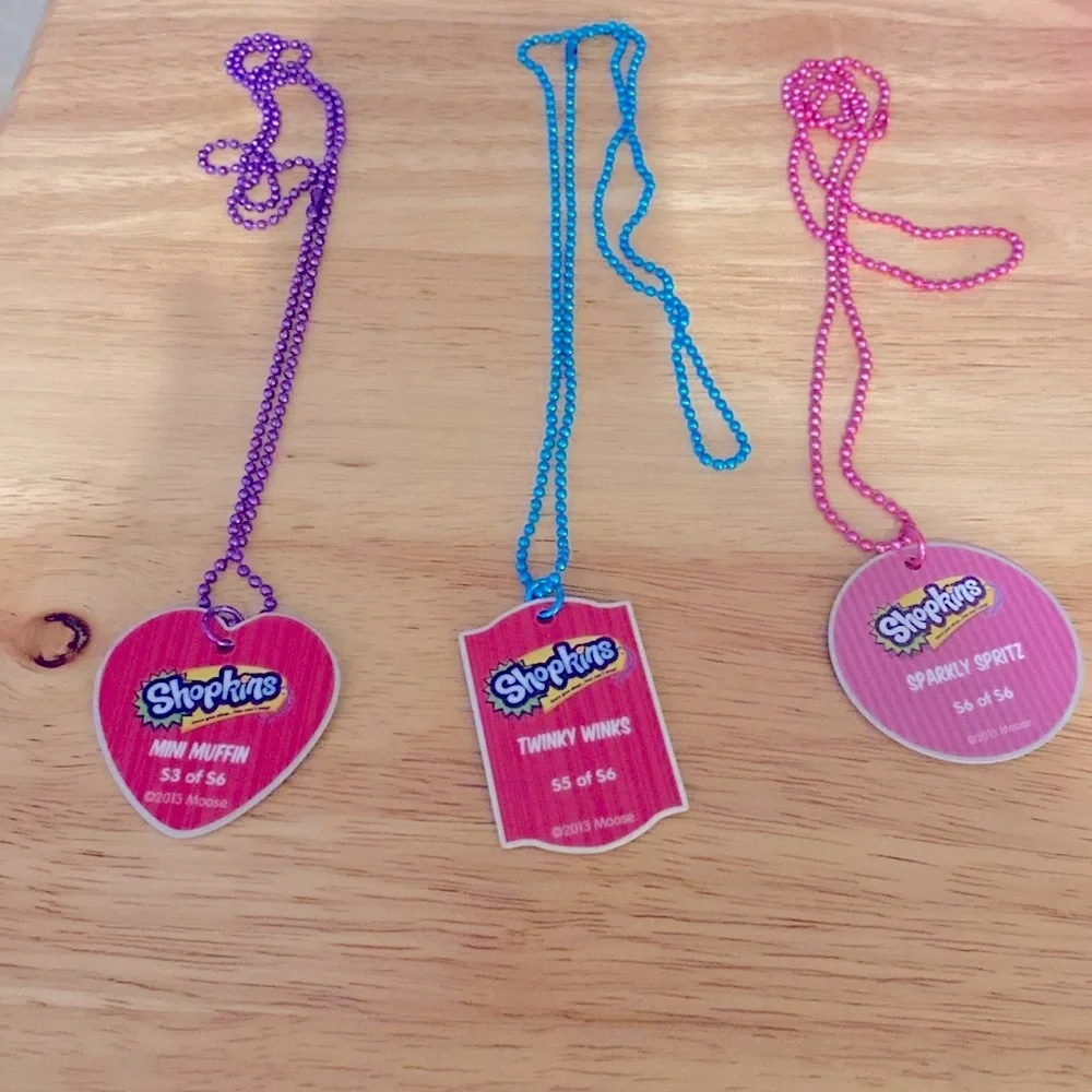 Three Shopkins Charm Necklaces/Dog Tags